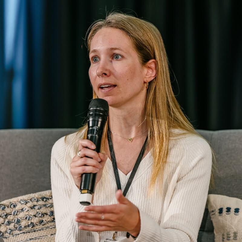 SAL Director Paige Brochu speaking at a conference