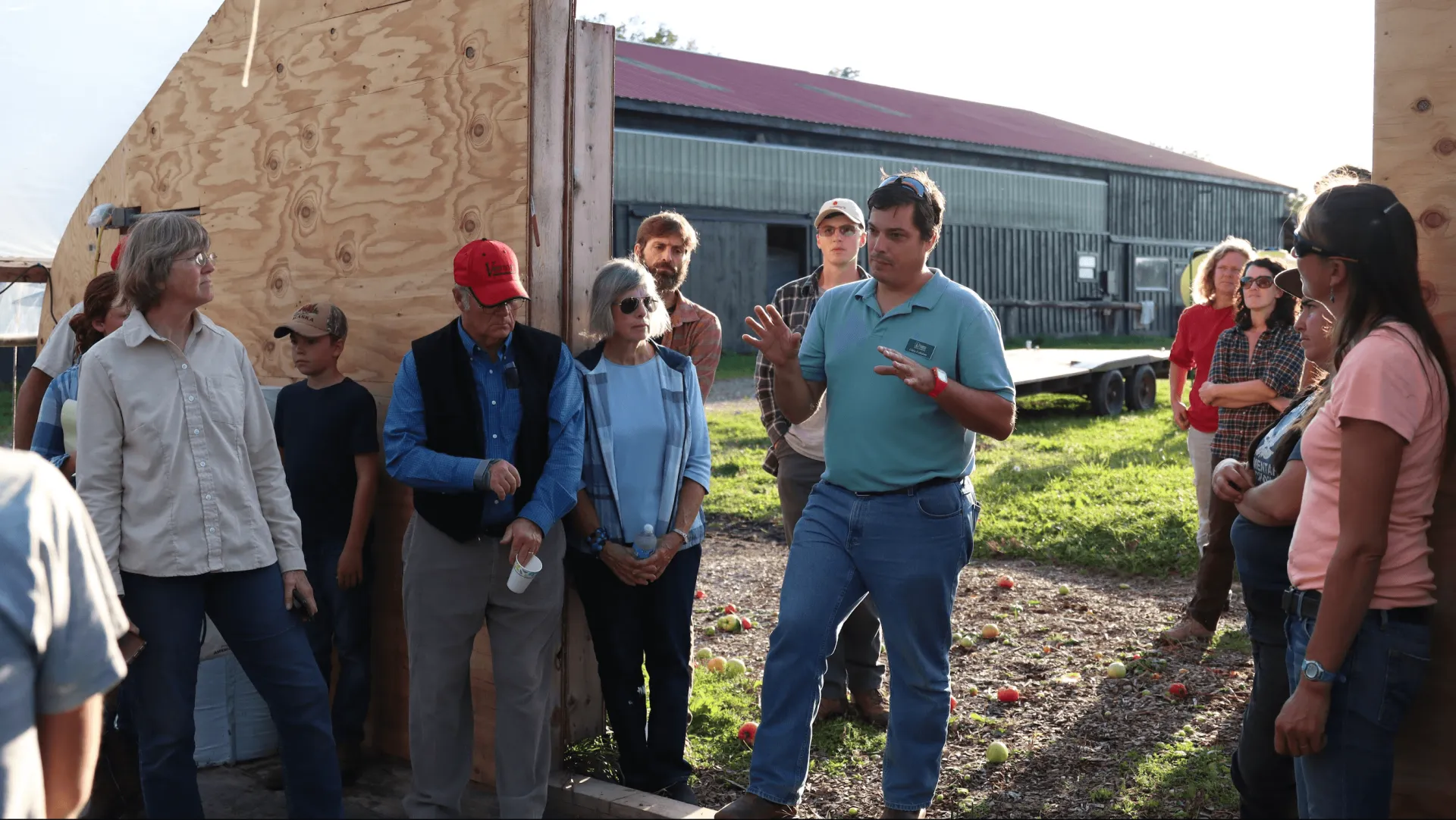 Man talking to group of farmers