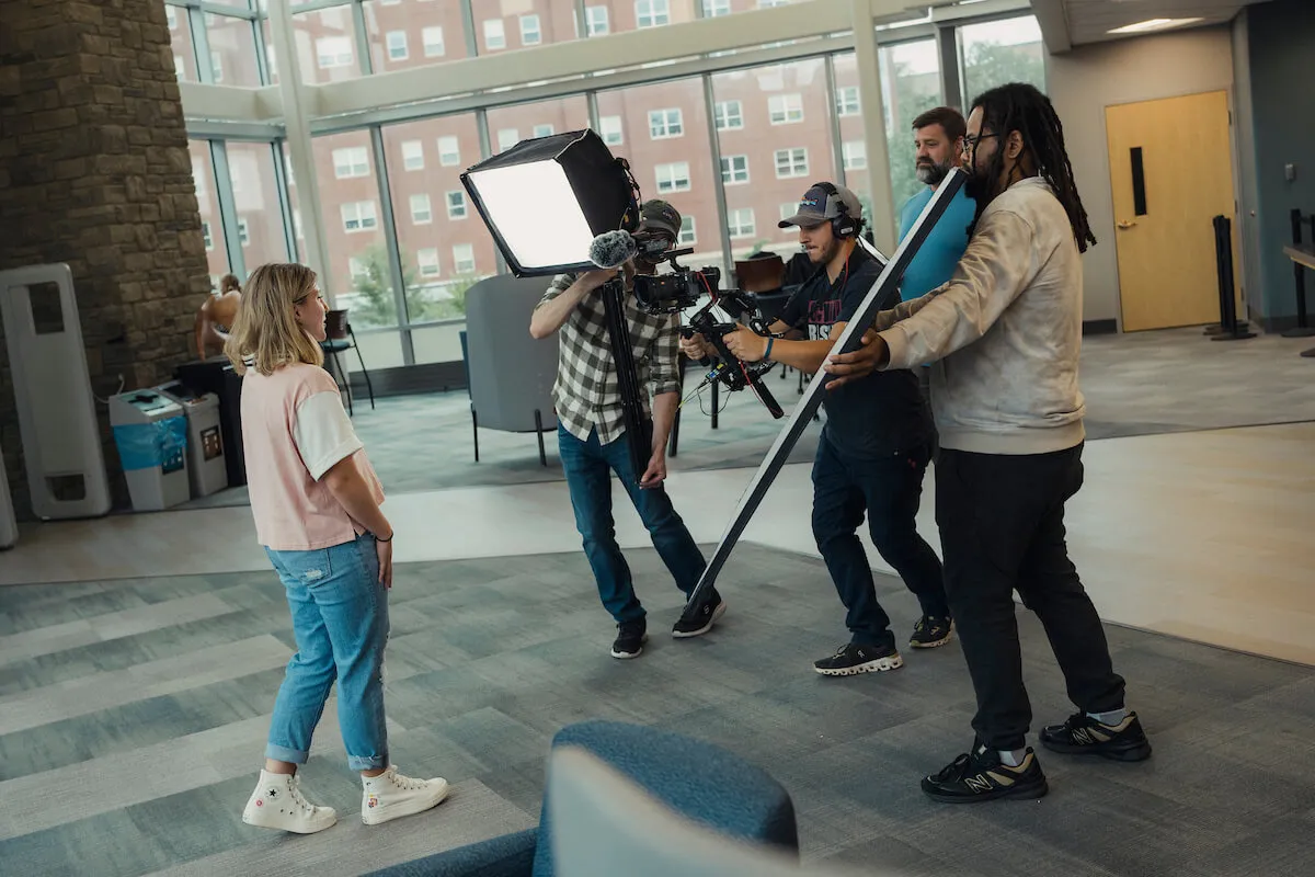 Group of people filming 