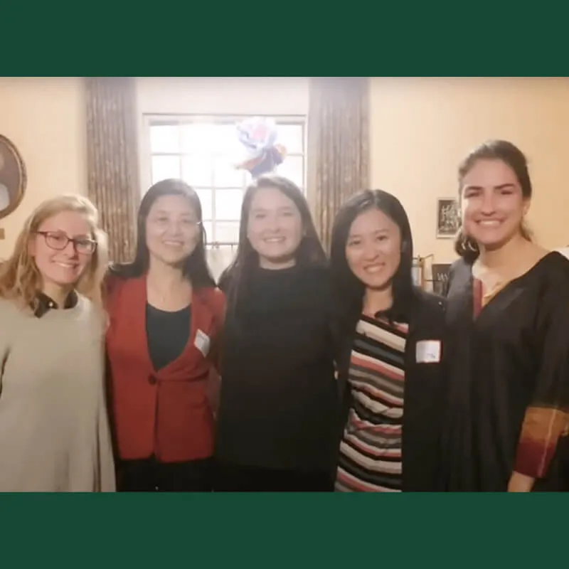 Group of faculty and student posing for a photo