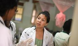 Clinician in emergency room with patient
