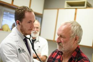 physician examining patient
