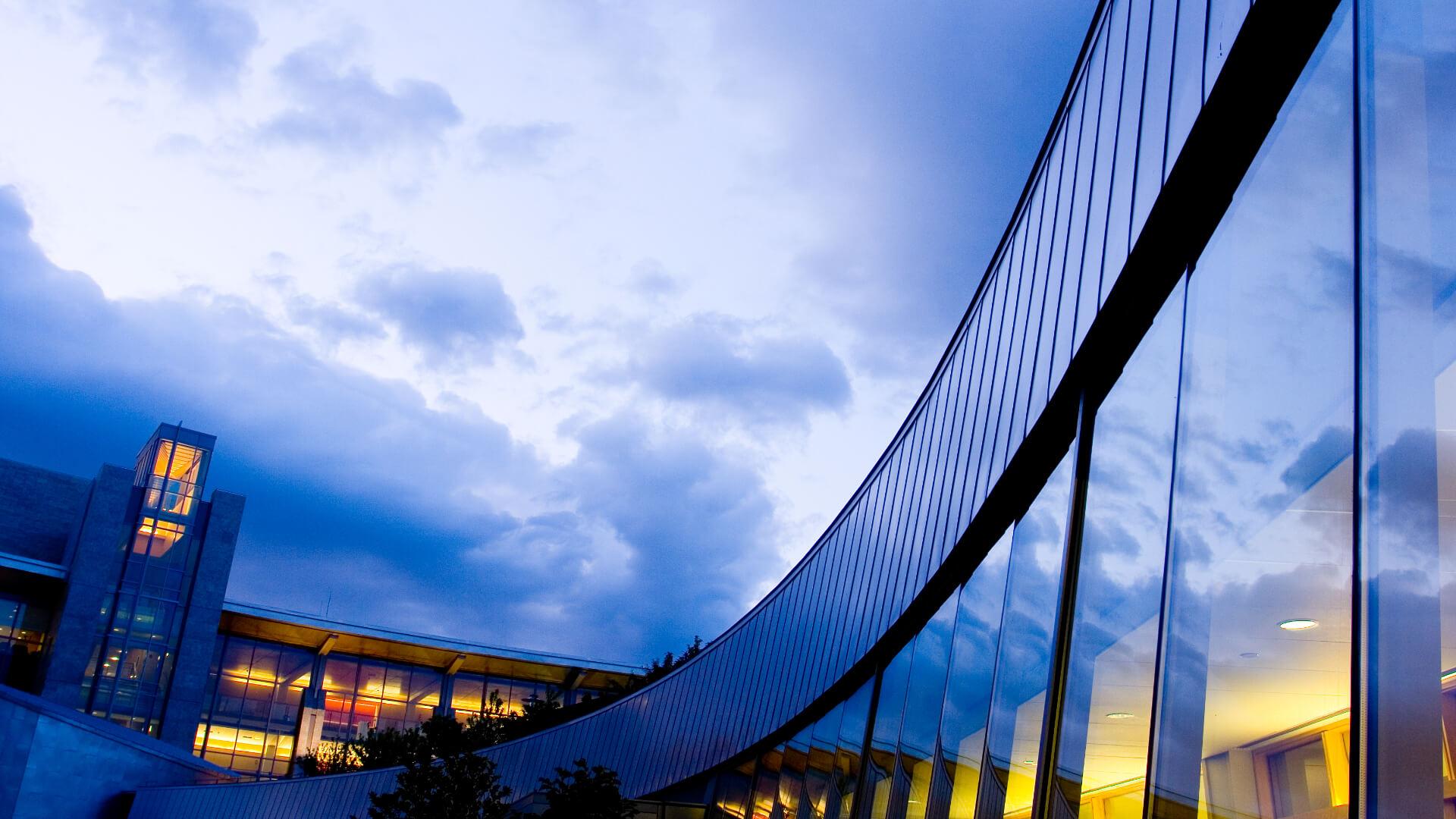soaring view of a buildings in blue evening light