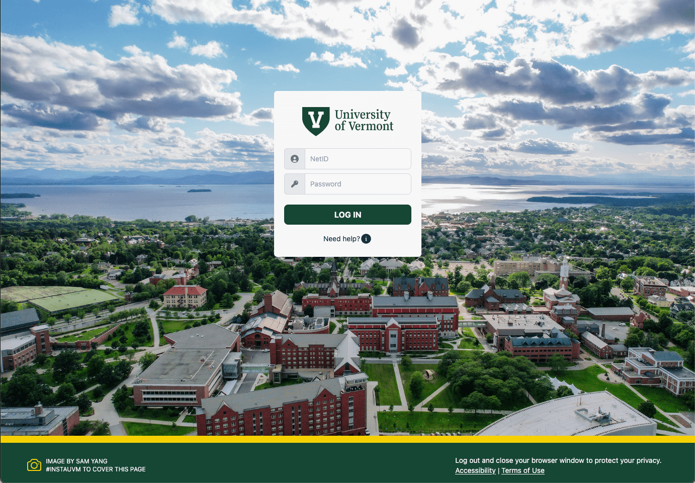 a screenshot of the current single-sign on page, which features an overhead view of campus, a partly cloudy sky, and Lake Champlain in the background