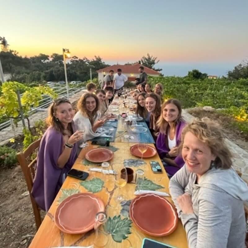 Students and faculty share a meal in Ikaria