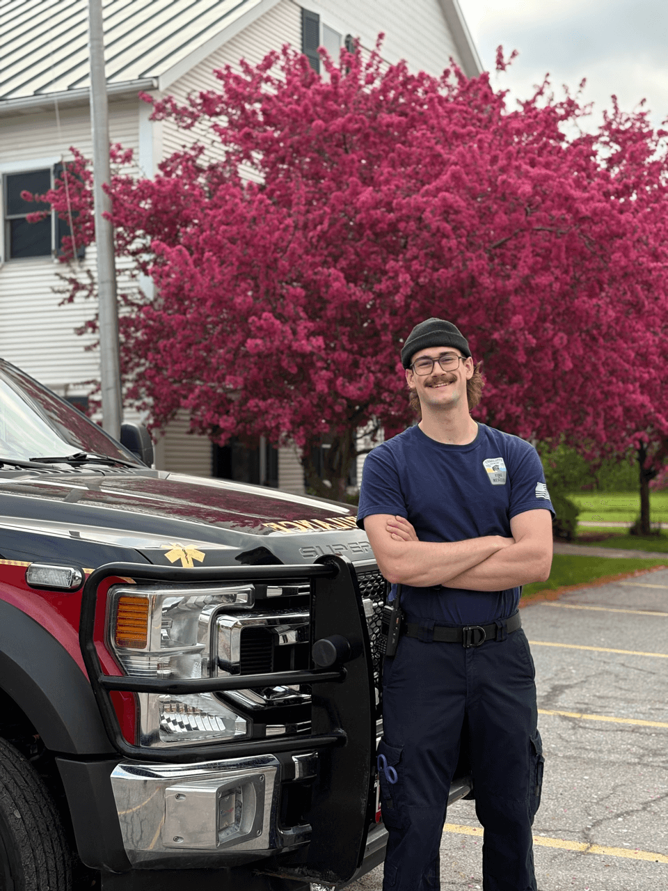 Student next to an ambulance