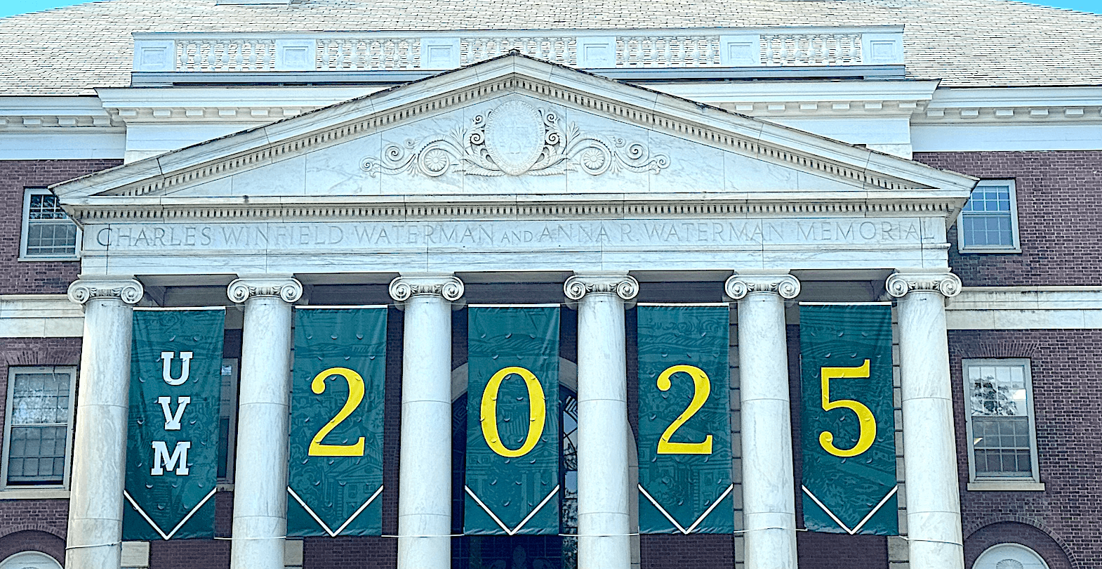 Uvm graduation banner on Waterman building