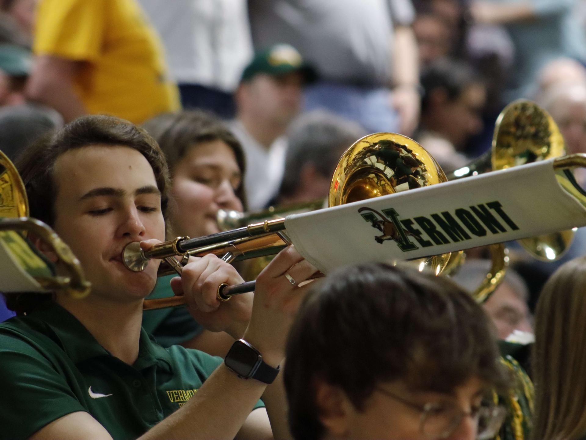 Student playing a trombone