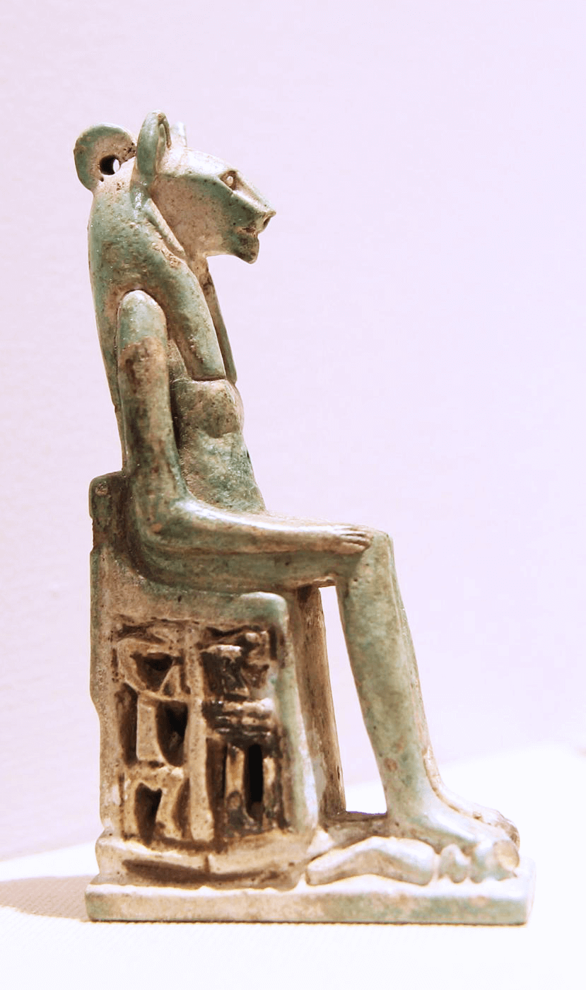 Ancient Egyptian amulet of a seated lion-headed goddess