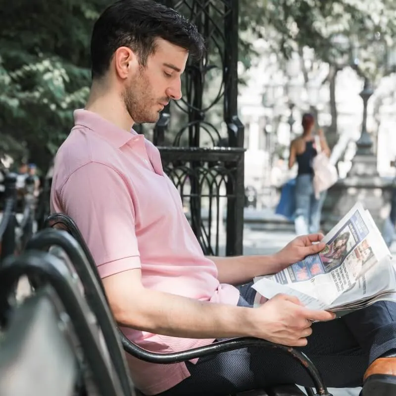 man reading newspaper