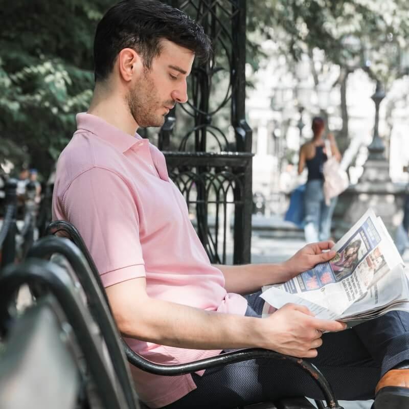 man reading newspaper