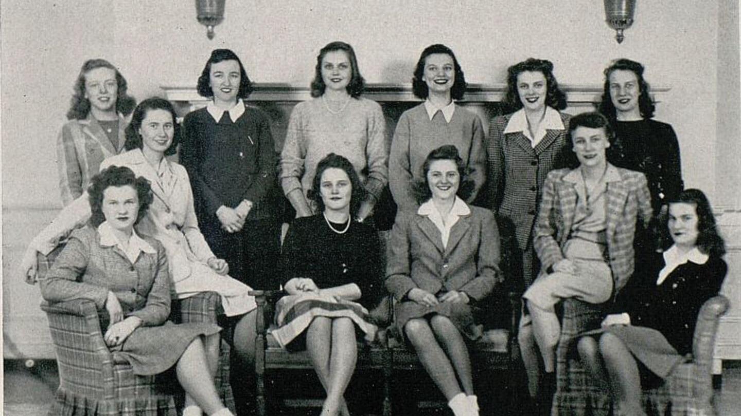 black and white photo of 12 women