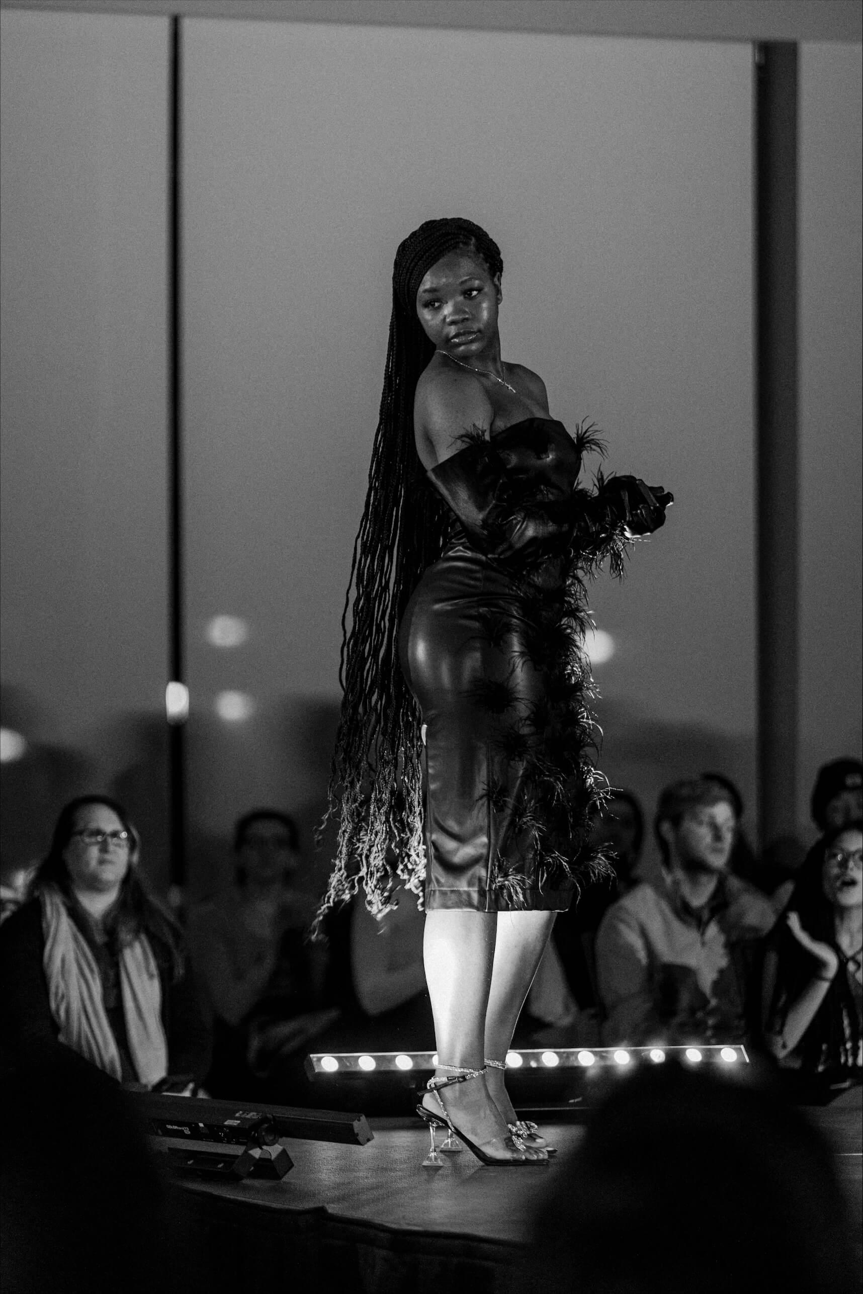 Student participating in a fashion show