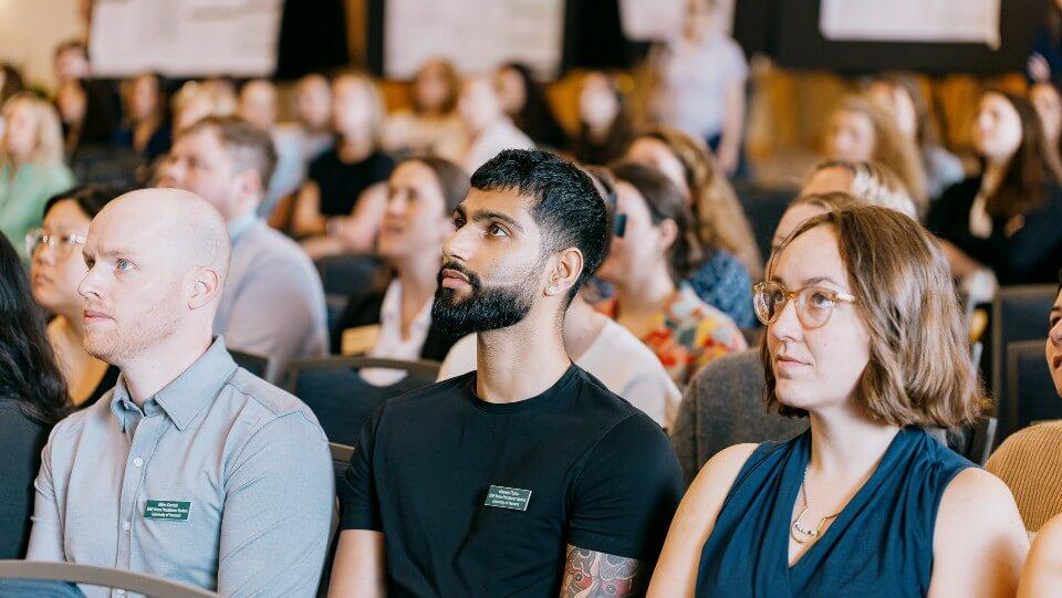 Audience listening to Zeigler Forum keynote