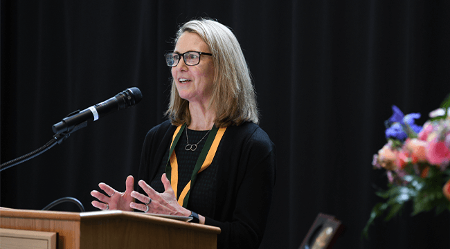 a woman at a podium