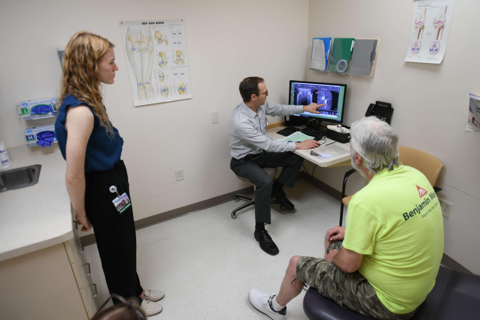 Doctor, med student patient visit