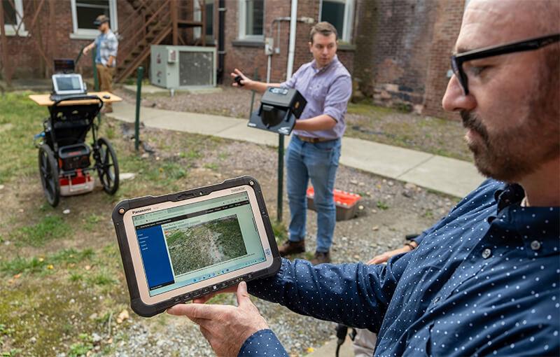 ME Professor Dylan Burns demos recently developed ground penetrating radar technology