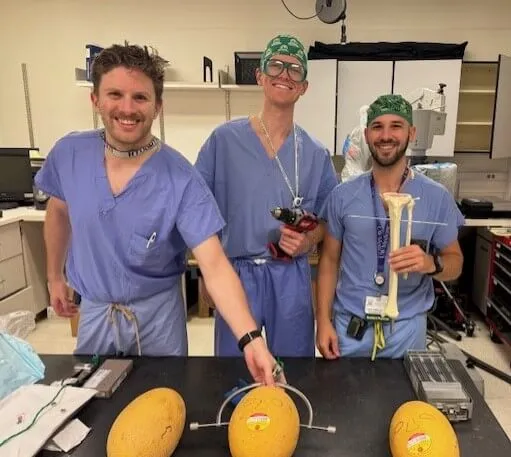 3 men in lab