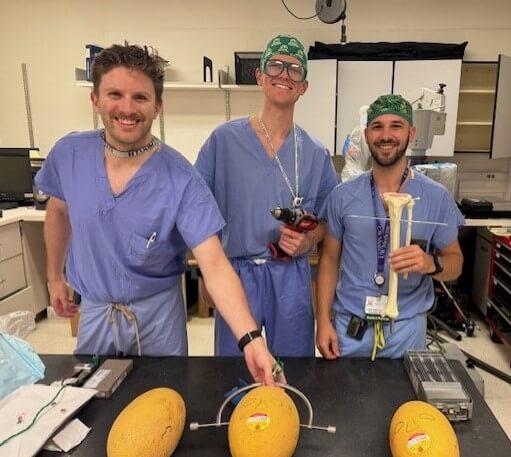3 men in lab