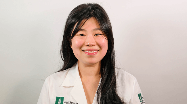 a person in a white coat