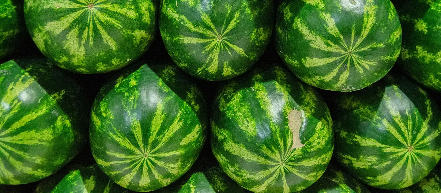 a stack of watermelons
