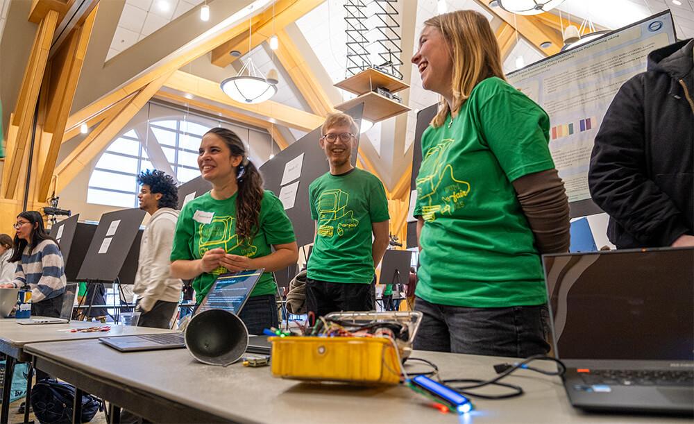 A team of graduate and undergraduate students present at the annual Computer Science Fair