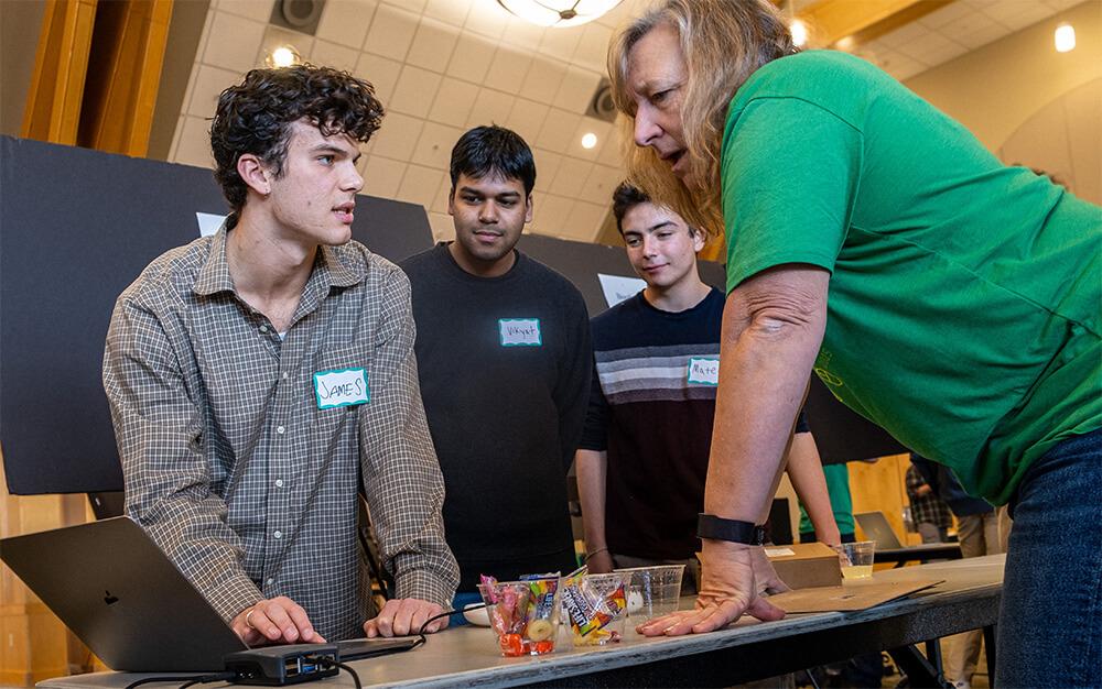 Computer Science students receive faculty feedback on their CS Fair project