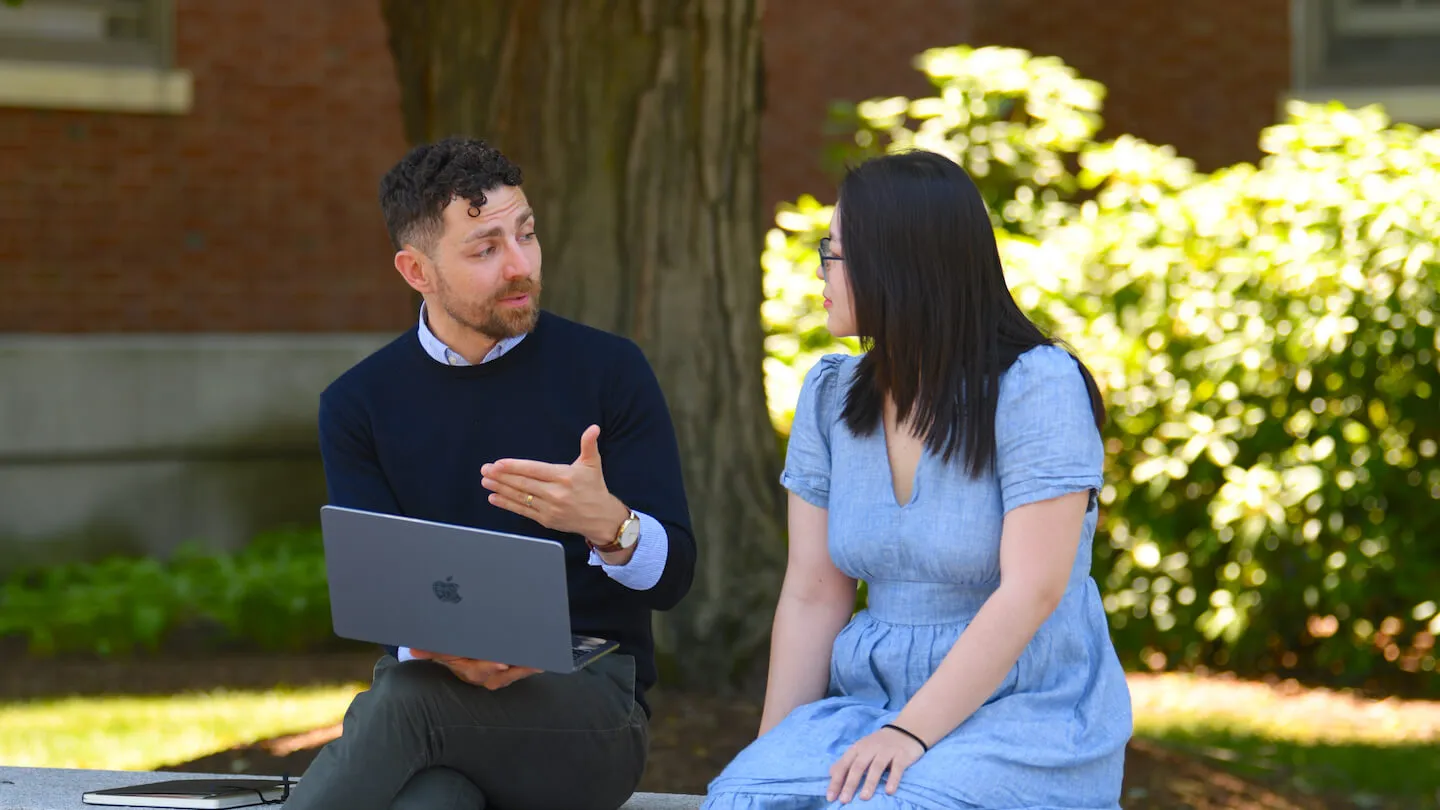 Matthew McCluskey discusses his research with PhD student Wang Jiao.