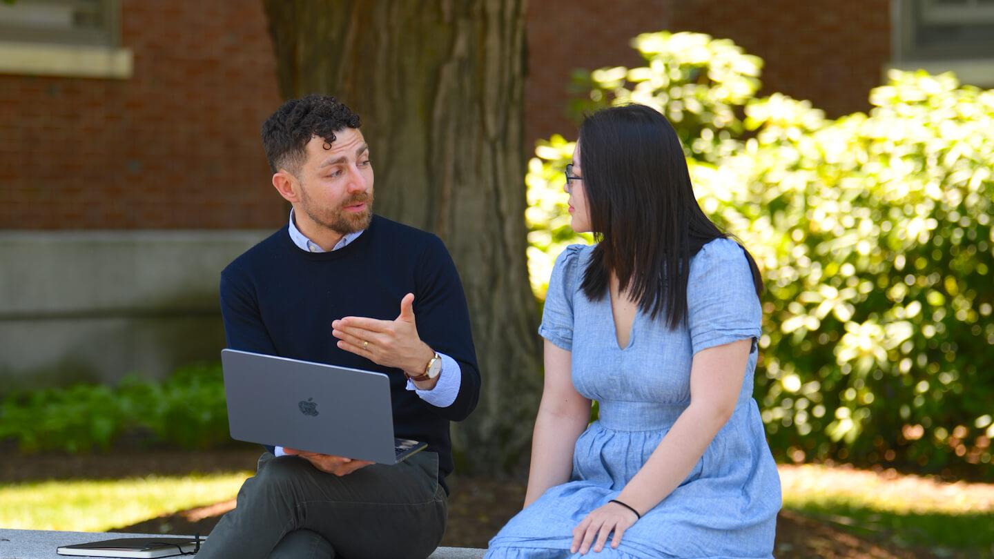 Matthew McCluskey discusses his research with PhD student Wang Jiao.