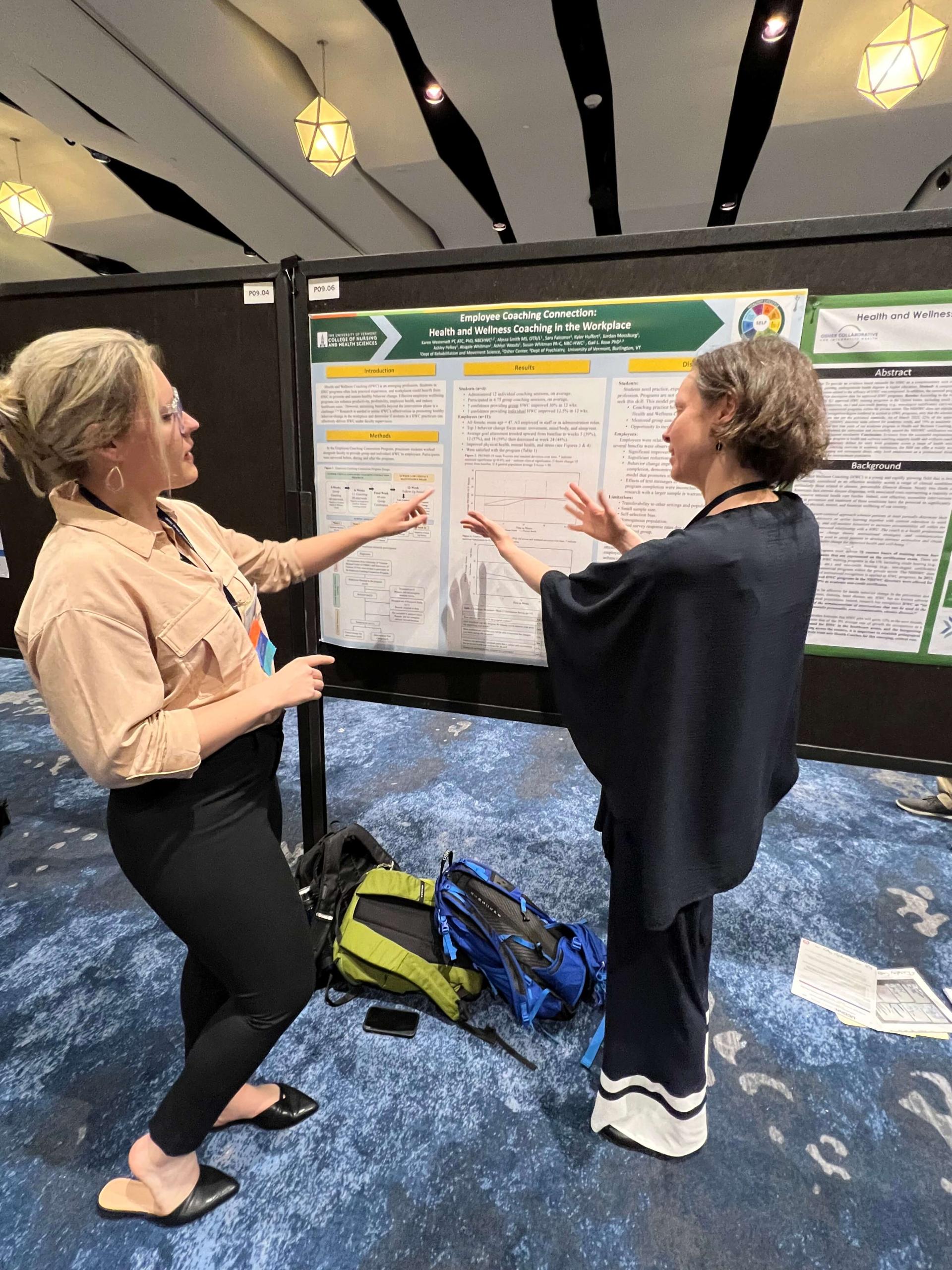 Whitman (Right), discusses how Health & Wellness Coaching is transforming workplace health with Alyssa Smith, PhD.