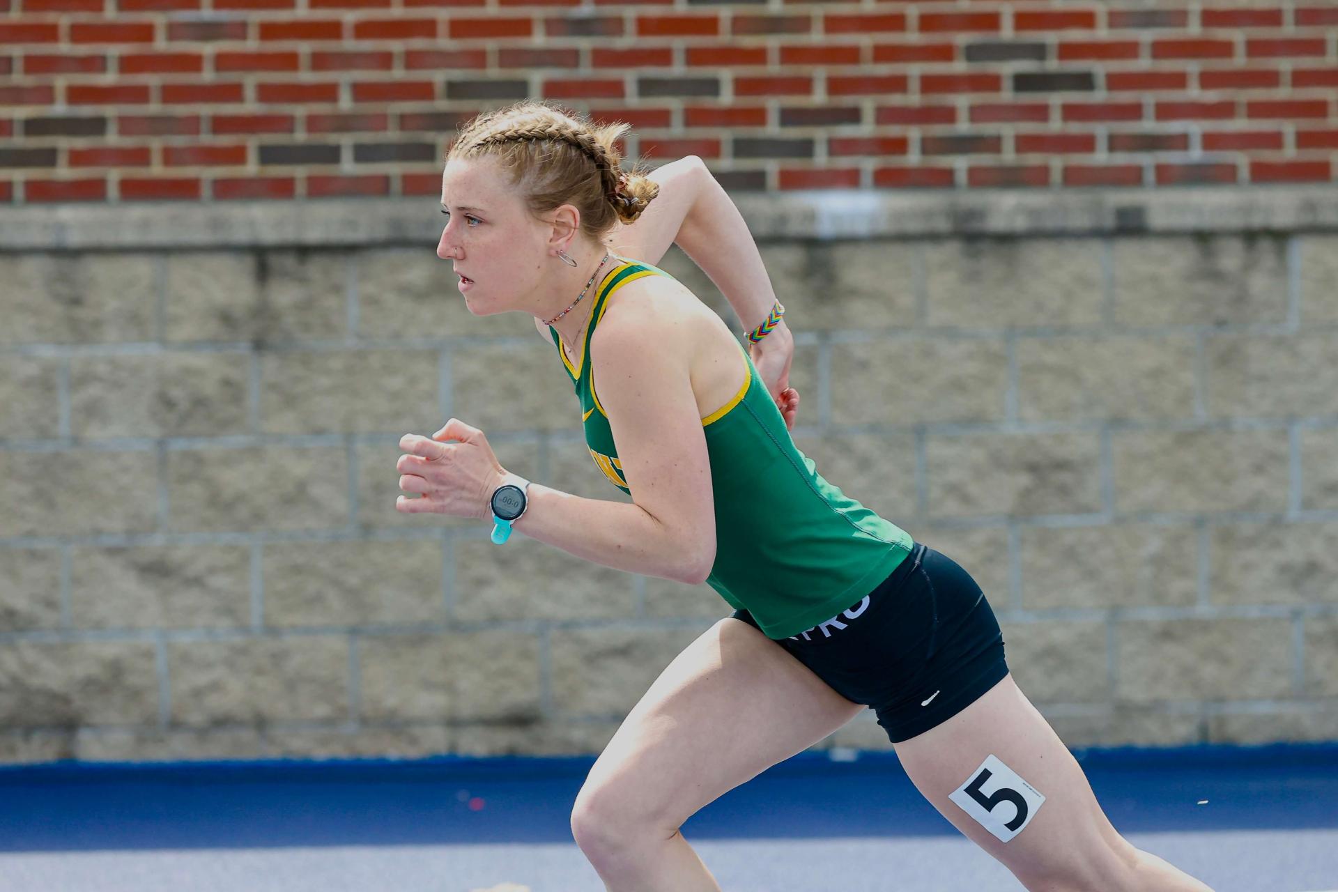 Cat Mawn running in a track meet.
