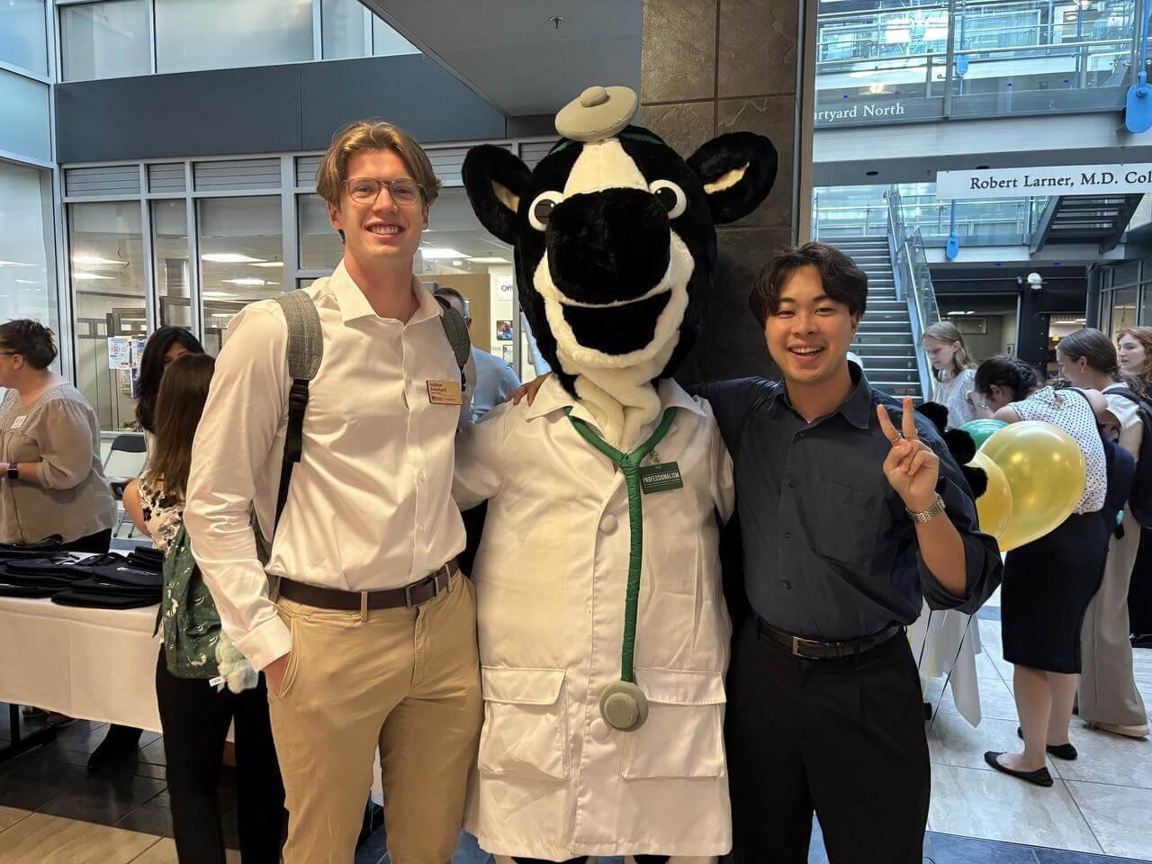 Class of 2029 students posing with Dr. Moo