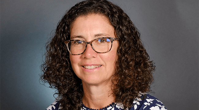 headshot of Julie Dumas, M.A., Ph.D.