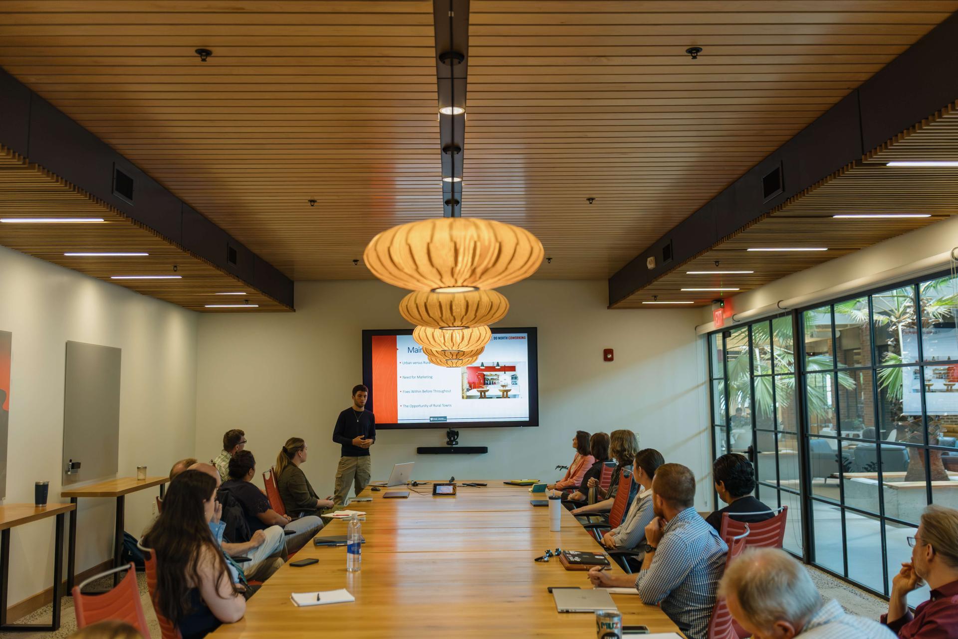 Students present on their experiences interning for Vermont's coworking spaces.
