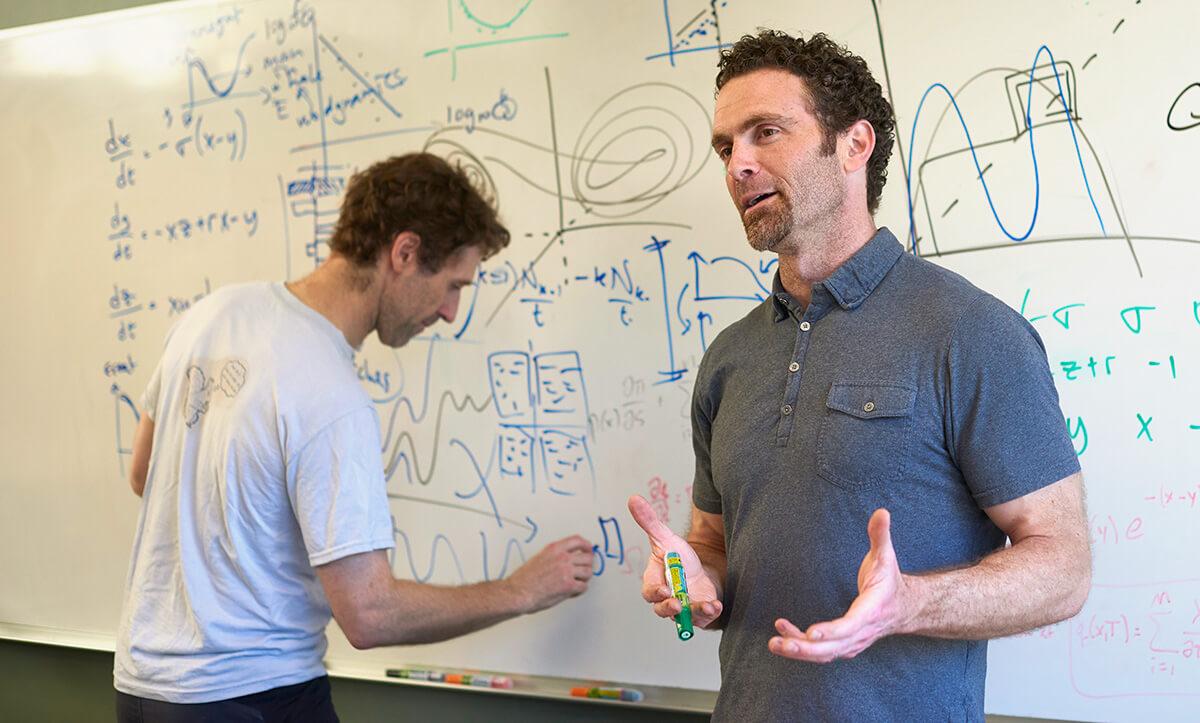 Professors Peter Dodds and Chris Danforth presenting in the Complex Systems Center