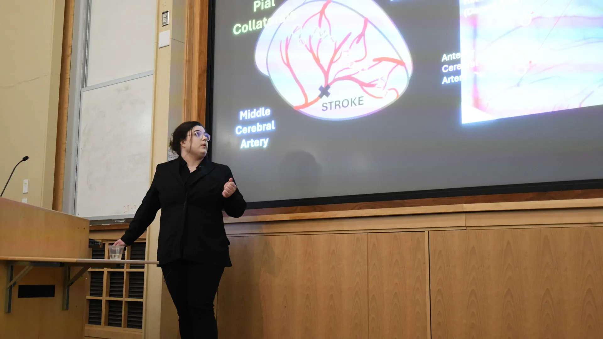 woment researcher presenting lecture