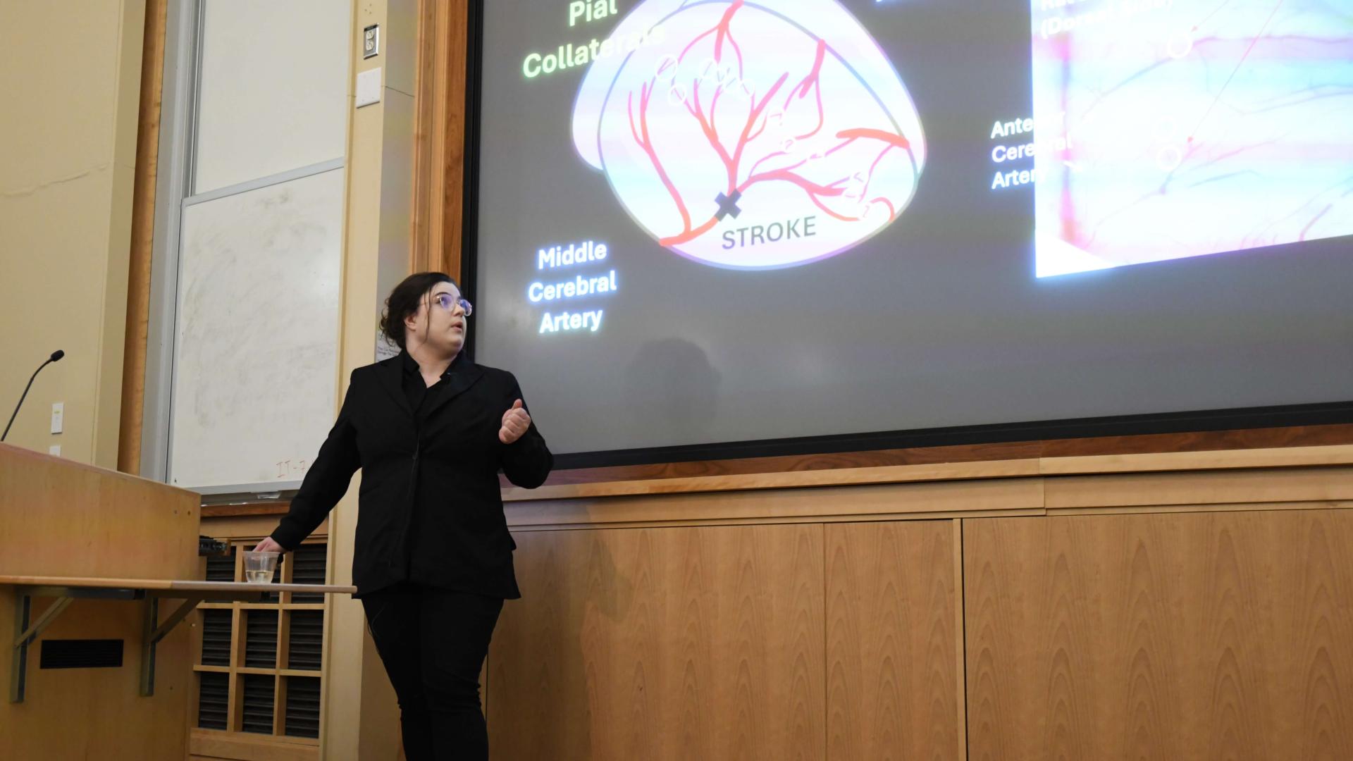 woment researcher presenting lecture
