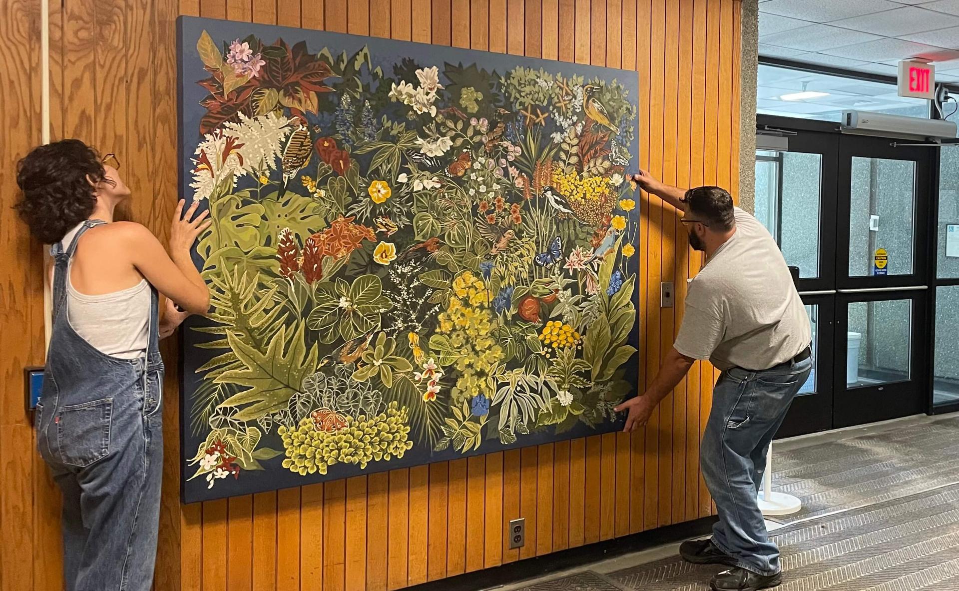 Peace Corps Mural being installed.