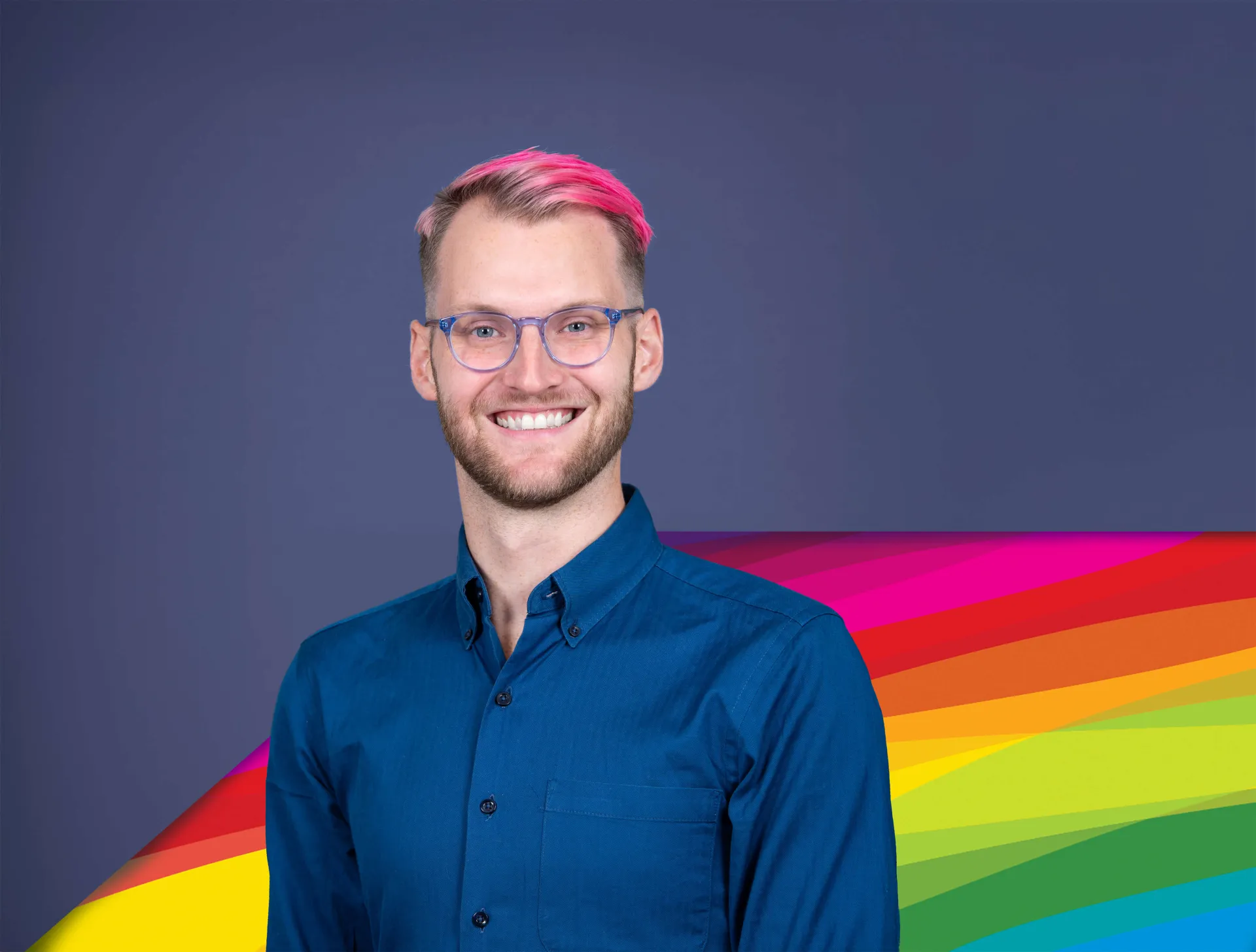 Image of Dr. Peters against a rainbow background