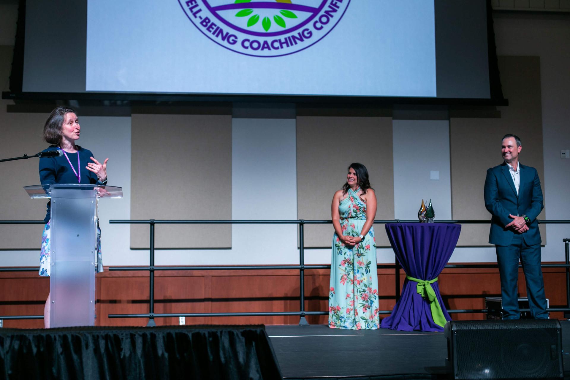Susan Whitman, PA-C, NBC-HWC, DipACLM, addressing the audience after winning the Raising the Bar Award at last year’s Health and Well-Being Coaching Conference.
