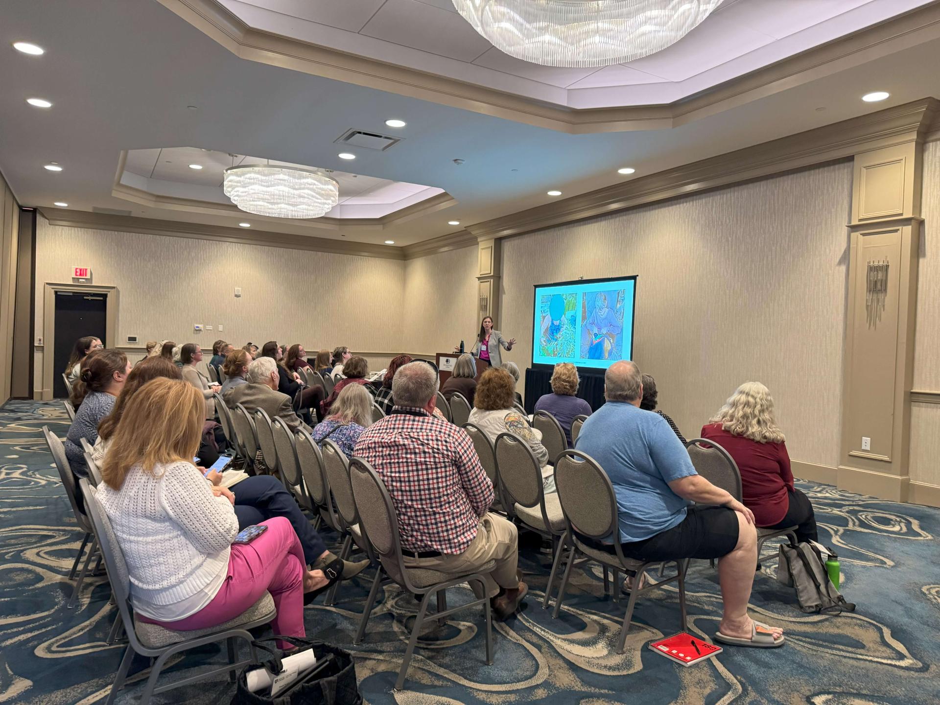 Audience listening to speaker at Gerontology Symposium