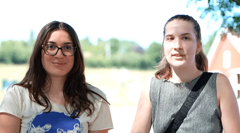 2 young women smiling