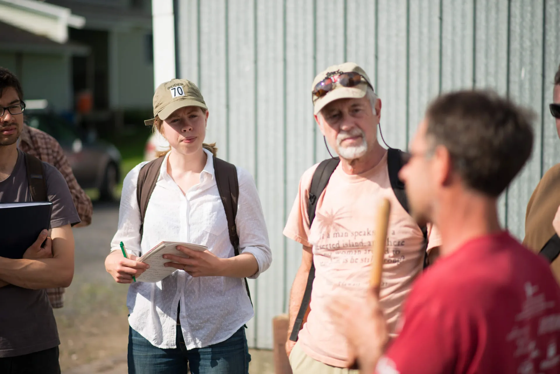 Three people learning outside