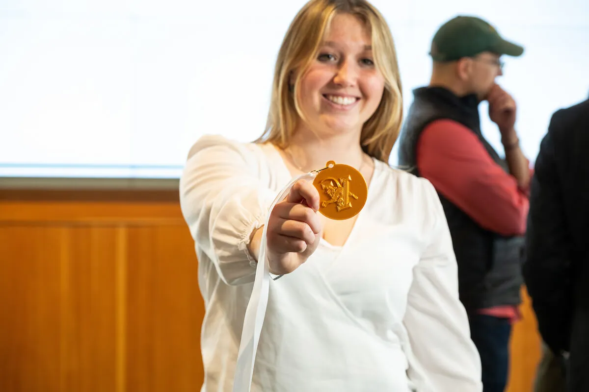 Pippa displays her medal