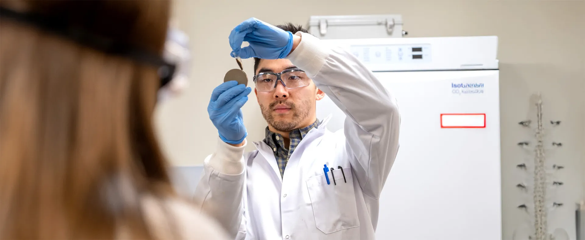A BME graduate student provides a demonstration to first-year BME students