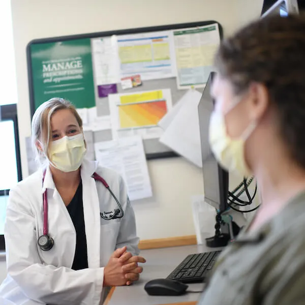 Physician and patient talking