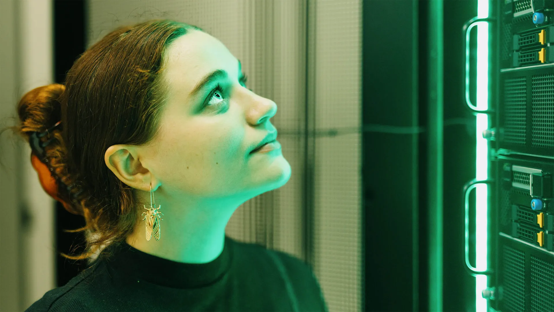 A student looks at a computer equipment