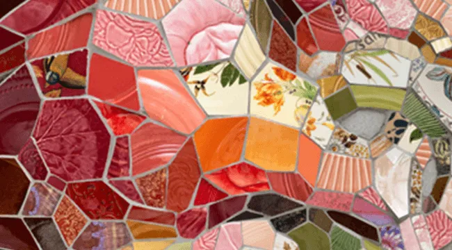 section of a collage made of ceramics, dishware, mortar, and cement