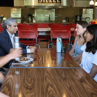 Students dine with a professor