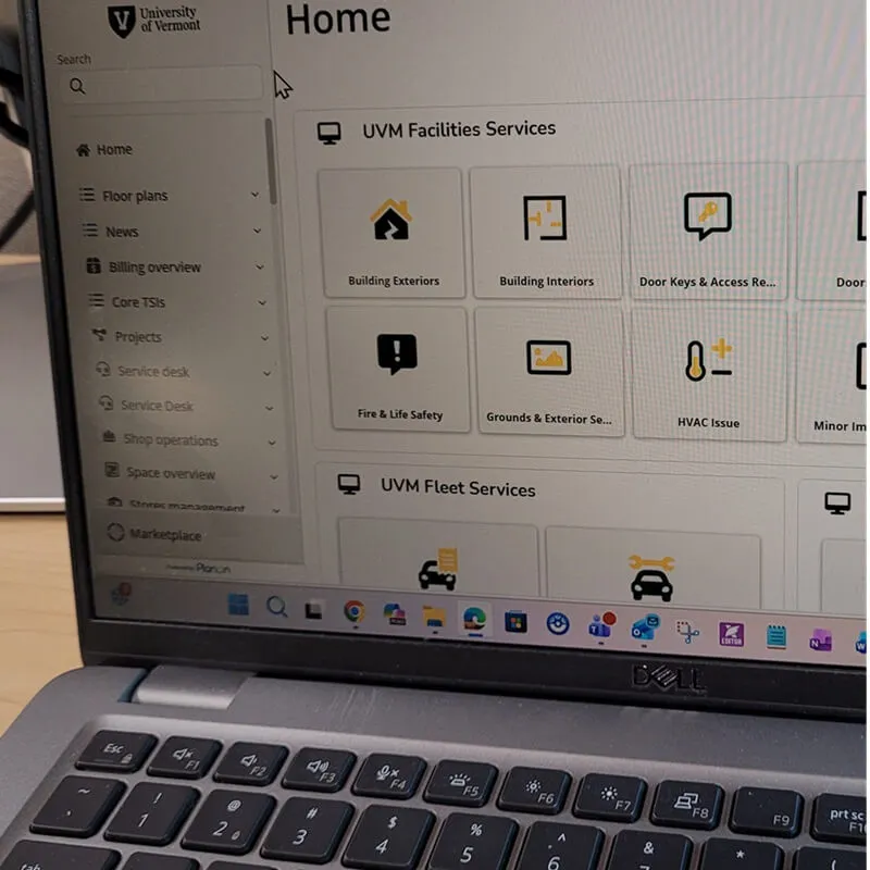 laptop computer screen showing planon menu icons